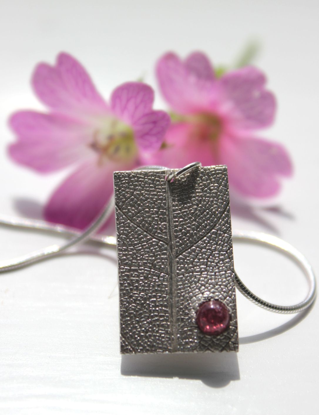 leaf-and-garnet-pendant-rectangle-by-little-silver-hedgehog