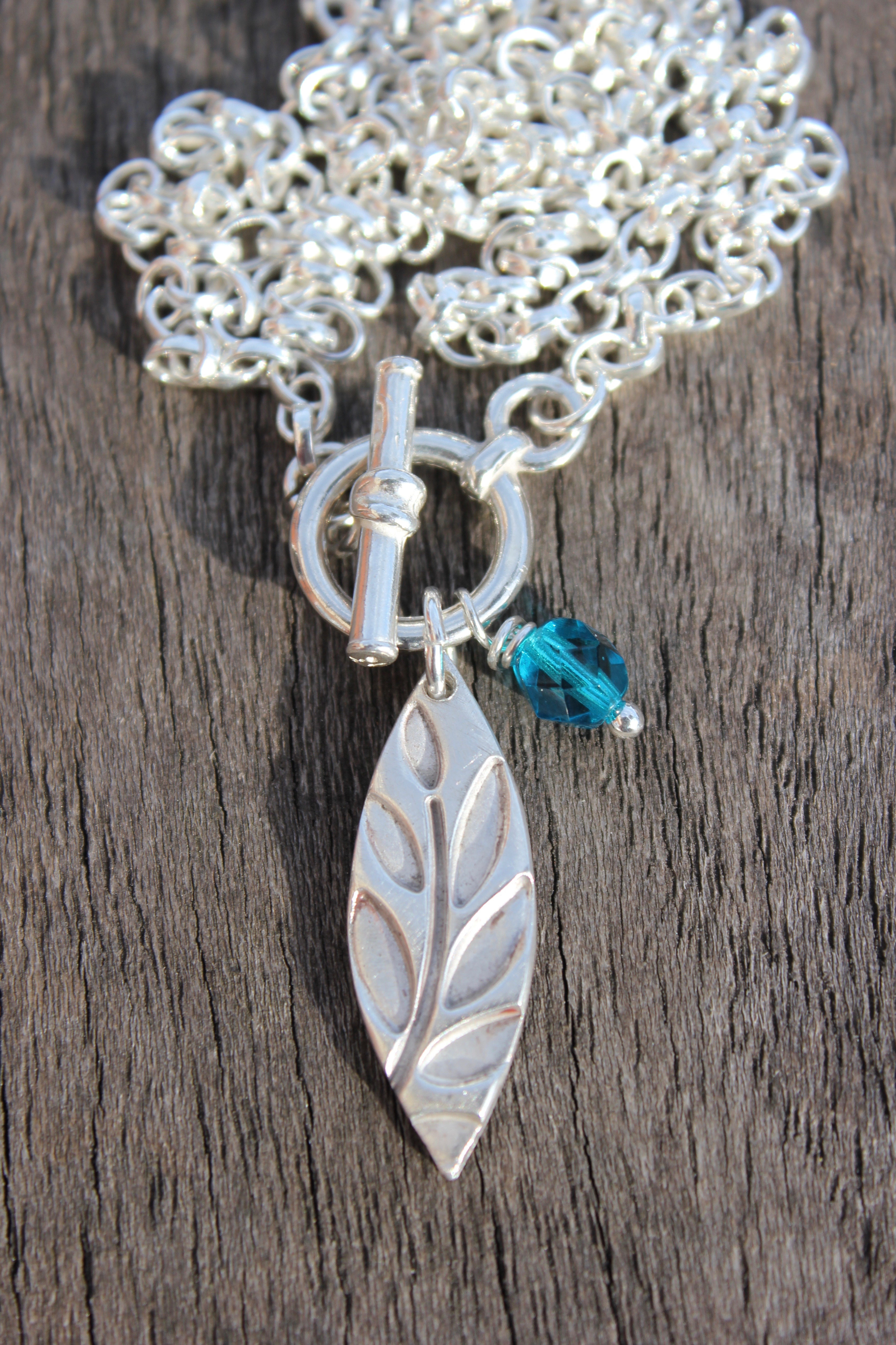 Front fastening contemporary silver leaf pendant