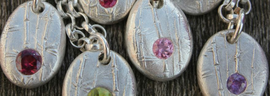 Silver pebble pendants by little silver hedgehog